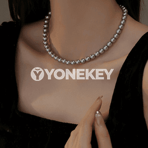 Zenanlar üçin owadan görnüşli merjen monjukly zynjyr.